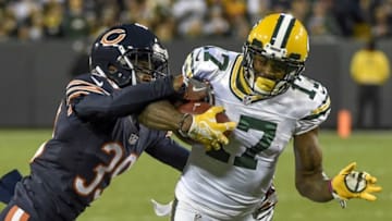Oct 20, 2016; Green Bay, WI, USA; Green Bay Packers wide receiver Davante Adams (17) is tackled by Chicago Bears cornerback Jacoby Glenn (39) after catching a pass in the third quarter at Lambeau Field. Mandatory Credit: Benny Sieu-USA TODAY Sports