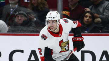 VANCOUVER, BC - DECEMBER 3: Dylan DeMelo #2 of the Ottawa Senators skates up ice during their NHL game against the Vancouver Canucks at Rogers Arena December 3, 2019 in Vancouver, British Columbia, Canada. (Photo by Jeff Vinnick/NHLI via Getty Images)"n