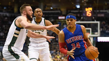 Feb 27, 2016; Milwaukee, WI, USA; Detroit Pistons forward Tobias Harris (34) drives for the basket against Milwaukee Bucks center Miles Plumlee (18) in the first quarter at BMO Harris Bradley Center. Mandatory Credit: Benny Sieu-USA TODAY Sports
