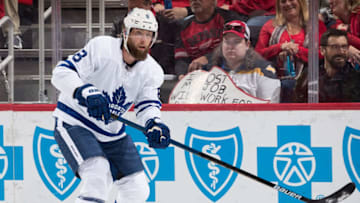DETROIT, MI - FEBRUARY 01: Jake Muzzin #8 of the Toronto Maple Leafs passes the puck during an NHL game against the Detroit Red Wings at Little Caesars Arena on February 1, 2019 in Detroit, Michigan. (Photo by Dave Reginek/NHLI via Getty Images)