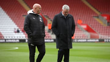 SOUTHAMPTON, ENGLAND - MARCH 07: Steve Agnew, First team coach of Newcastle United (L) and Steve Bruce, Manager of Newcastle United (R) inspect the pitch prior to the Premier League match between Southampton FC and Newcastle United at St Mary's Stadium on March 07, 2020 in Southampton, United Kingdom. (Photo by Charlie Crowhurst/Getty Images)