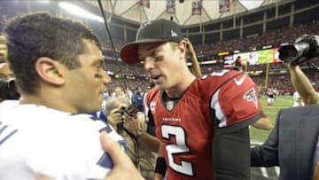 Jan 13, 2013; Atlanta, GA, USA; Seattle Seahawks quarterback Russell Wilson (3) congratulates Atlanta Falcons quarterback Matt Ryan (2) after the Falcons defeated the Seahawks 30-28 in the NFC divisional playoff game at the Georgia Dome. Mandatory Credit: John David Mercer-USA TODAY Sports