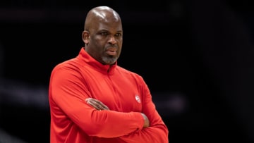 CHARLOTTE, NORTH CAROLINA - MARCH 16: Nate McMillan of the Atlanta Hawks looks on in the first quarter during their game against the Charlotte Hornets at Spectrum Center on March 16, 2022 in Charlotte, North Carolina. NOTE TO USER: User expressly acknowledges and agrees that, by downloading and or using this photograph, User is consenting to the terms and conditions of the Getty Images License Agreement. (Photo by Jacob Kupferman/Getty Images)