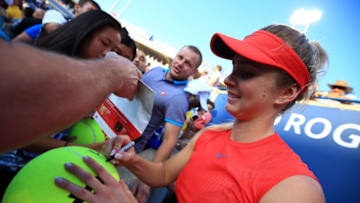 TORONTO, ON - AUGUST 12: Elina Svitolina of Ukraine signs autographs for fans following her semifinal victory over Simona Halep of Romania on Day 8 of the Rogers Cup at Aviva Centre on August 12, 2017 in Toronto, Canada. (Photo by Vaughn Ridley/Getty Images)
