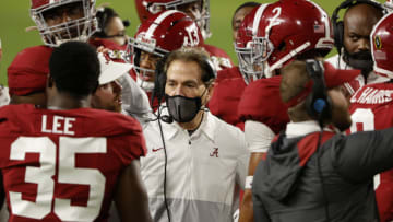 MIAMI GARDENS, FLORIDA - JANUARY 11: Head coach Nick Saban of the Alabama Crimson Tide speaks to his team during the CFP National Championship Presented by AT&T at Hard Rock Stadium on January 11, 2021 in Miami Gardens, Florida. (Photo by Sam Greenwood/Getty Images)
