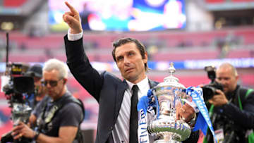 LONDON, ENGLAND - MAY 19: Antonio Conte, Manager of Chelsea celebrates with the Emirates FA Cup Trophy following his sides victory in The Emirates FA Cup Final between Chelsea and Manchester United at Wembley Stadium on May 19, 2018 in London, England. (Photo by Laurence Griffiths/Getty Images)