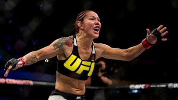 CURITIBA, BRAZIL - MAY 14: Cris 'Cyborg' Justino of Brazil celebrates after defeating Leslie Smith of the United States in their catchweight bout during the UFC 198 at Arena da Baixada stadium on May 14, 2016 in Curitiba, Brazil. (Photo by Buda Mendes/Zuffa LLC/Zuffa LLC via Getty Images)