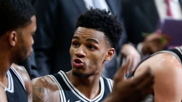SAN ANTONIO,TX - APRIL 22 : Rudy Gay #22 of the San Antonio Spurs talks with Dejounte Murray #5 of the San Antonio Spurs during a timeout against the Golden State Warriors In the second half of Game Four of Round One of the 2018 NBA Playoffs at AT&T Center on April 22 , 2018 in San Antonio, Texas. NOTE TO USER: User expressly acknowledges and agrees that , by downloading and or using this photograph, User is consenting to the terms and conditions of the Getty Images License Agreement. (Photo by Ronald Cortes/Getty Images)
