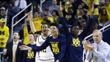 Jan 2, 2016; Ann Arbor, MI, USA; Michigan Wolverines head coach John Beilein and players reacts to a three point basket ah against the Penn State Nittany Lions at Crisler Center. Mandatory Credit: Rick Osentoski-USA TODAY Sports
