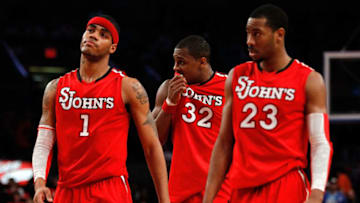 NEW YORK - MARCH 10: D.J. Kennedy #1, Justin Brownlee #32 and Paris Horne #23 of the St. John's basketball team look on towards the end of their game against the Marquette Golden Eagles during the second round of 2010 NCAA Big East Tournament at Madison Square Garden on March 10, 2010 in New York City. (Photo by Michael Heiman/Getty Images)