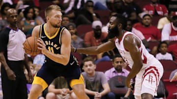HOUSTON, TX - OCTOBER 04: Domantas Sabonis #11 of the Indiana Pacers backs in on James Harden #13 of the Houston Rockets during the second quarter at Toyota Center on October 4, 2018 in Houston, Texas. NOTE TO USER: User expressly acknowledges and agrees that, by downloading and or using this photograph, User is consenting to the terms and conditions of the Getty Images License Agreement. (Photo by Bob Levey/Getty Images)