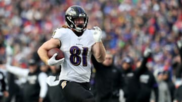 ORCHARD PARK, NEW YORK - DECEMBER 08: Hayden Hurst #81 of the Baltimore Ravens runs the ball for a touchdown during the third quarter of an NFL game against the Buffalo Bills at New Era Field on December 08, 2019 in Orchard Park, New York. (Photo by Bryan M. Bennett/Getty Images)