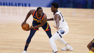 SAN FRANCISCO, CALIFORNIA - MAY 21: Draymond Green #23 of the Golden State Warriors is guarded by Jaren Jackson Jr. #13 of the Memphis Grizzlies in the first quarter of the NBA Play-In Tournament game at Chase Center on May 21, 2021 in San Francisco, California. NOTE TO USER: User expressly acknowledges and agrees that, by downloading and or using this photograph, User is consenting to the terms and conditions of the Getty Images License Agreement. (Photo by Lachlan Cunningham/Getty Images)