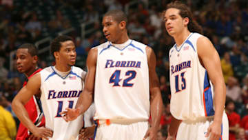 Mar 9, 2007; Atlanta, GA, USA; Florida Gators guard Taurean Green (11), forward Al Horford (42) and forward Joakim Noah wait between plays against the Georgia Bulldogs during the second half of a quarterfinal round SEC Tournament game at the Georgia Dome in Atlanta, GA. Floirda won 74-57. Mandatory Credit: Jason Parkhurst-USA TODAY Sports Copyright © 2007 Jason Parkhurst