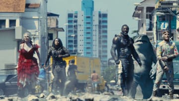 (L-r) MARGOT ROBBIE as Harley Quinn, DANIELA MELCHIOR as Ratcatcher 2, IDRIS ELBA as Bloodsport, KING SHARK and DAVID DASTMALCHIAN as Polka Dot Man in Warner Bros. Pictures’ action adventure “THE SUICIDE SQUAD,” a Warner Bros. Pictures release. Courtesy of Warner Bros. Pictures/™ & © DC Comics. © 2021 Warner Bros. Entertainment Inc. All Rights Reserved.