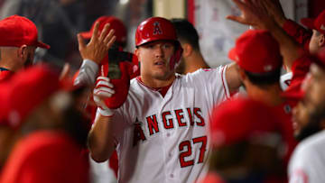 ANAHEIM, CA - SEPTEMBER 25: Mike Trout #27 of the Los Angeles Angels of Anaheim celebrates during the game against the Texas Rangers at Angel Stadium on September 25, 2018 in Anaheim, California. (Photo by Masterpress/Getty Images)