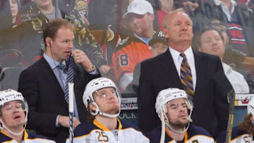 OTTAWA, CANADA - FEBRUARY 05: Assistant coach Kevyn Adams (L) and head coach Lindy Ruff (R) of the Buffalo Sabres watch the action during an NHL game against the Ottawa Senators at Scotiabank Place on February 5, 2013 in Ottawa, Ontario, Canada. (Photo by Jana Chytilova/Freestyle Photography/Getty Images)