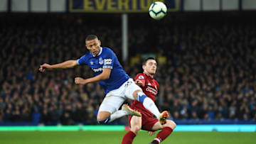 LIVERPOOL, ENGLAND - MARCH 03: Richarlison of Everton battles with Andy Robertson of Liverpool during the Premier League match between Everton FC and Liverpool FC at Goodison Park on March 03, 2019 in Liverpool, United Kingdom. (Photo by Michael Regan/Getty Images)