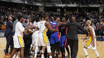 Jan 2, 2016; Indianapolis, IN, USA; Referees and coaches try to separate the Indiana Pacers and the Detroit Pistons as they get into an altercation at the end of the game at Bankers Life Fieldhouse. Indiana defeats Detroit 94-82. Mandatory Credit: Brian Spurlock-USA TODAY Sports