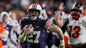 Auburn footballNov 19, 2022; Auburn, Alabama, USA; Auburn Tigers running back Jarquez Hunter (27) carries for a touchdown during the fourth quarter against the Western Kentucky Hilltoppers at Jordan-Hare Stadium. Mandatory Credit: John Reed-USA TODAY Sports