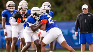 Florida Gators inside linebacker Jaden Robinson (29), left and Florida Gators inside linebacker Deuce Spurlock II (22), right, run drills Thursday. The University of Florida Gators held a Spring football practice at Sanders Practice Fields in Gainesville, FL on Thursday, March 9, 2023. [Doug Engle/Gainesville Sun]Gai Uffootballspring3