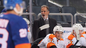 ELMONT, NEW YORK - OCTOBER 02: Head coach John Tortorella of the Philadelphia Flyers handles the bench against the New York Islanders at the UBS Arena on October 02, 2022 in Elmont, New York. (Photo by Bruce Bennett/Getty Images)