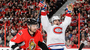 OTTAWA, ON - APRIL 26: Milan Michalek #9 of the Ottawa Senators skates past Max Pacioretty #67 of the Montreal Canadiens as he celebrates a goal by teammate Brendan Gallagher #11 (not pictured) in Game Six of the Eastern Conference Quarterfinals during the 2015 NHL Stanley Cup Playoffs at Canadian Tire Centre on April 26, 2015 in Ottawa, Ontario, Canada. The Montreal Canadiens eliminated the Ottawa Senators by defeating them 2-0 and move to the next round of the Stanley Cup Playoffs. (Photo by Minas Panagiotakis/Getty Images)