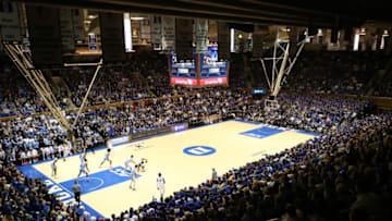 DURHAM, NORTH CAROLINA - FEBRUARY 20: Zion Williamson #1 of the Duke Blue Devils falls as his shoe breaks against Luke Maye #32 of the North Carolina Tar Heels during their game at Cameron Indoor Stadium on February 20, 2019 in Durham, North Carolina. (Photo by Streeter Lecka/Getty Images)