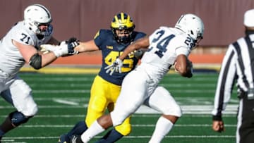 Michigan linebacker Adam Shibley tries to tackle Penn State running back Keyvone Lee during the second half of Michigan's 27-17 loss at Michigan Stadium on Saturday, Nov. 28, 2020.
