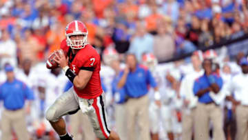 JACKSONVILLE, FL - NOVEMBER 01: Quarterback Matthew Stafford #7of the Georgia Bulldogs rolls out to pass against the Florida Gators at Jacksonville Municipal Stadium on November 1, 2008 in Jacksonville, Florida. Florida defeated Georgia 49-10.(Photo by Rob Tringali/Sportschrome/Getty Images)