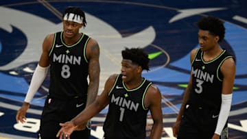 Jarred Vanderbilt, Anthony Edwards and Jaden McDaniels of the Minnesota Timberwolves. (Photo by Hannah Foslien/Getty Images)