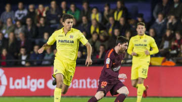 VILLARREAL, SPAIN - DECEMBER 10: Lionel Andres Messi (R) of FC Barcelona competes for the ball with Rodrigo Hernandez Cascante, Rodri, of Villarreal CF during the La Liga 2017-18 match between Villarreal CF and FC Barcelona at Estadio de la Ceramica on 10 December 2017 in Villarreal, Spain. (Photo by Power Sport Images/Getty Images)