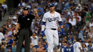 LOS ANGELES, CA - OCTOBER 26: Yasmani Grandal #9 of the Los Angeles Dodgers reacts to his second inning strike out against the Boston Red Sox in Game Three of the 2018 World Series at Dodger Stadium on October 26, 2018 in Los Angeles, California. (Photo by Harry How/Getty Images)
