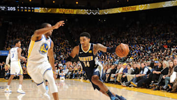 OAKLAND, CA - JANUARY 8: Gary Harris #14 of the Denver Nuggets handles the ball against the Golden State Warriors on January 8, 2018 at ORACLE Arena in Oakland, California. NOTE TO USER: User expressly acknowledges and agrees that, by downloading and or using this photograph, user is consenting to the terms and conditions of Getty Images License Agreement. Mandatory Copyright Notice: Copyright 2018 NBAE (Photo by Noah Graham/NBAE via Getty Images)