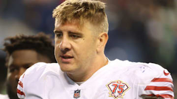 SEATTLE, WASHINGTON - DECEMBER 05: Daniel Brunskill #60 of the San Francisco 49ers reacts after the 30-23 loss to the Seattle Seahawks at Lumen Field on December 05, 2021 in Seattle, Washington. (Photo by Abbie Parr/Getty Images)