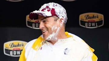 South Carolina football coach Shane Beamer after getting a Duke's Mayo bath after winning against the North Carolina Tar Heels after the Duke's Mayo Bowl in 2021. Mandatory Credit: Syndication: The Greenville News