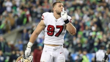 SEATTLE, WASHINGTON - DECEMBER 29: Nick Bosa #97 of the San Francisco 49ers silences the crowd after stopping the Seattle Seahawks on fourth down in the fourth quarter to defeat the Seattle Seahawks 26-21 during their game at CenturyLink Field on December 29, 2019 in Seattle, Washington. (Photo by Abbie Parr/Getty Images)