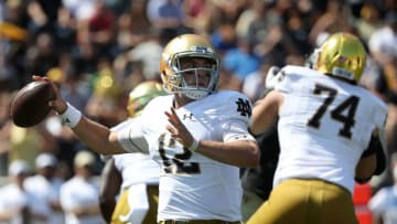 WINSTON SALEM, NC - SEPTEMBER 22: Ian Book #12 of the Notre Dame Fighting Irish drops back to pass against the Wake Forest Demon Deacons during their game at BB&T Field on September 22, 2018 in Winston Salem, North Carolina. (Photo by Streeter Lecka/Getty Images)