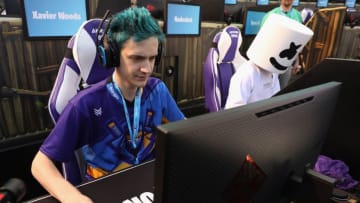 LOS ANGELES, CA - JUNE 12: Gamers 'Ninja' (L) and 'Marshmello' compete in the Epic Games Fortnite E3 Tournament at the Banc of California Stadium on June 12, 2018 in Los Angeles, California. (Photo by Christian Petersen/Getty Images)
