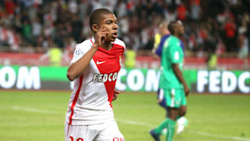MONACO, MONACO - MAY 17: Kylian Mbappe of Monaco celebrates scoring a goal during the French Ligue 1 match between AS Monaco and AS Saint-Etienne (ASSE) at Stade Louis II on May 17, 2017 in Monaco, Monaco. (Photo by Jean Catuffe/Getty Images)
