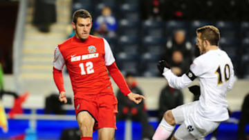 New Mexico Lobos defenseman Kyle Venter passes the ball past Notre Dame forward. USA Today.