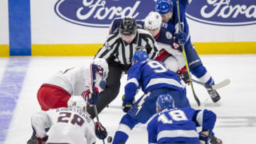 TAMPA, FL - APRIL 10: Tampa Bay Lightning center Steven Stamkos (91) and Columbus Blue Jackets left wing Nick Foligno (71) faceoff during the Stanley Cup Playoffs between the Lightning and Columbus on April 10, 2019 at Amalie Arena in Tampa, FL. (Photo by Andrew Bershaw/Icon Sportswire via Getty Images)