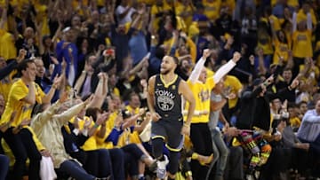 OAKLAND, CA - MAY 01: Stephen Curry #30 of the Golden State Warriors reacts after making a three-point basket against the New Orleans Pelicans during Game Two of the Western Conference Semifinals during the 2018 NBA Playoffs at ORACLE Arena on May 1, 2018 in Oakland, California. The basket was his first attempt after returning from an injury. NOTE TO USER: User expressly acknowledges and agrees that, by downloading and or using this photograph, User is consenting to the terms and conditions of the Getty Images License Agreement. (Photo by Ezra Shaw/Getty Images)