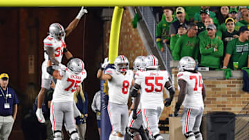 Sep 23, 2023; South Bend, Indiana, USA; Ohio State Buckeyes running back TreVeyon Henderson (32) celebrates a third quarter touchdown against the Notre Dame Fighting Irish at Notre Dame Stadium. Mandatory Credit: Matt Cashore-USA TODAY Sports