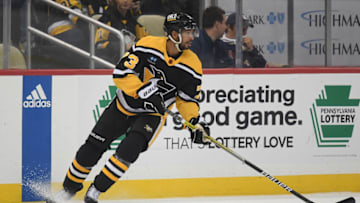 PITTSBURGH, PA - DECEMBER 20: Pierre-Olivier Joseph #73 of the Pittsburgh Penguins skates with the puck in the second period during the game against the New York Rangers at PPG PAINTS Arena on December 20, 2022 in Pittsburgh, Pennsylvania. (Photo by Justin Berl/Getty Images)