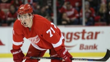Jan 17, 2016; Detroit, MI, USA; Detroit Red Wings center Dylan Larkin (71) looks for the puck during the second period of the game against the Philadelphia Flyers at Joe Louis Arena. The Flyers defeated the Red Wings 2-1. Mandatory Credit: Leon Halip-USA TODAY Sports
