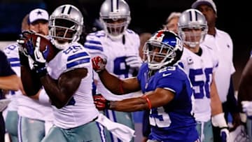 Sept 5, 2012; East Rutherford, NJ, USA; Dallas Cowboys wide receiver Dez Bryant (88) makes a catch against New York Giants cornerback Corey Webster (23) during the first half at MetLife Stadium. Mandatory Credit: Noah K. Murray/THE STAR-LEDGER via US PRESSWIRE