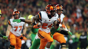 Nov 29, 2014; Corvallis, OR, USA; Oregon State Beavers running back Storm Woods (24) runs the ball against the Oregon Ducks at Reser Stadium. Mandatory Credit: Scott Olmos-USA TODAY Sports