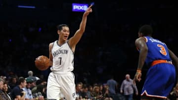 Oct 20, 2016; Brooklyn, NY, USA; Brooklyn Nets guard Jeremy Lin (7) handles the ball against New York Knicks guard Brandon Jennings (3) during second half at Barclays Center. The New York Knicks defeated the Brooklyn Nets 116-111.Mandatory Credit: Noah K. Murray-USA TODAY Sports