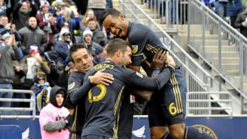 Mar 20, 2016; Philadelphia, PA, USA; Philadelphia Union forward C.J. Sapong (17) celebrates with teammates forward Chris Pontius (13) and midfielder Roland Alberg (6) against the New England Revolution during the first half at Talen Energy Stadium. Mandatory Credit: Eric Hartline-USA TODAY Sports